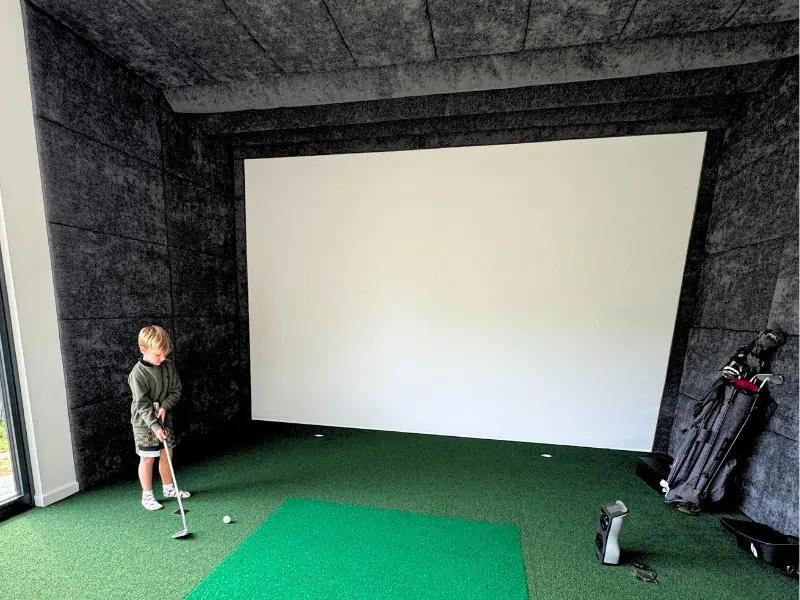 Kids playing golf