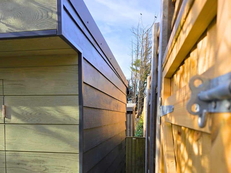 green cladding on garden room